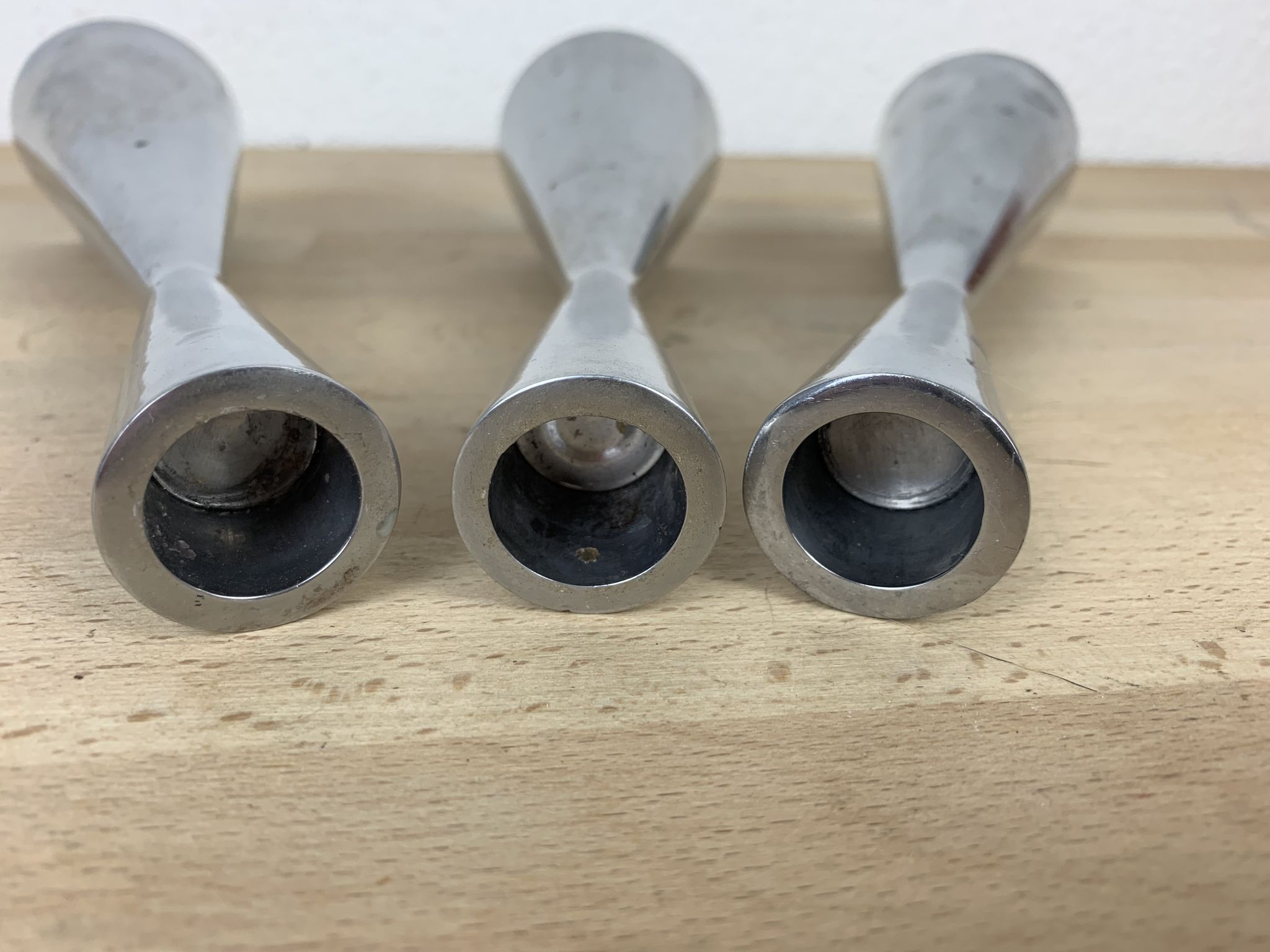 Trio diabolo aluminum candle holders by Erika Pekkari for Ikea