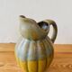 Old ceramic jug in the shape of a gourd by Louis Lourioux