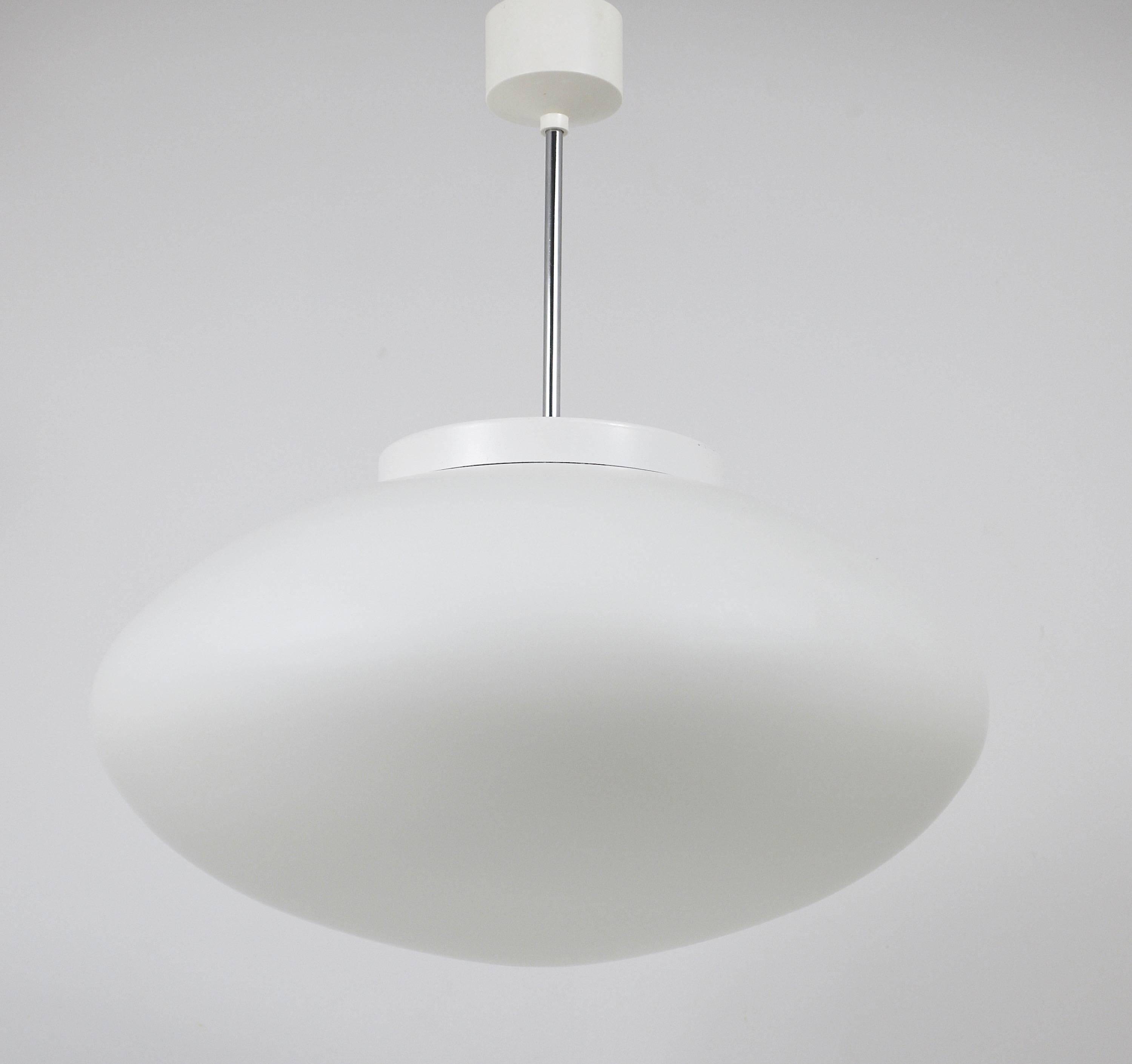 Up to 40 huge elliptical opaline glass pendants, in the style of Lisa Johansson-Pape.