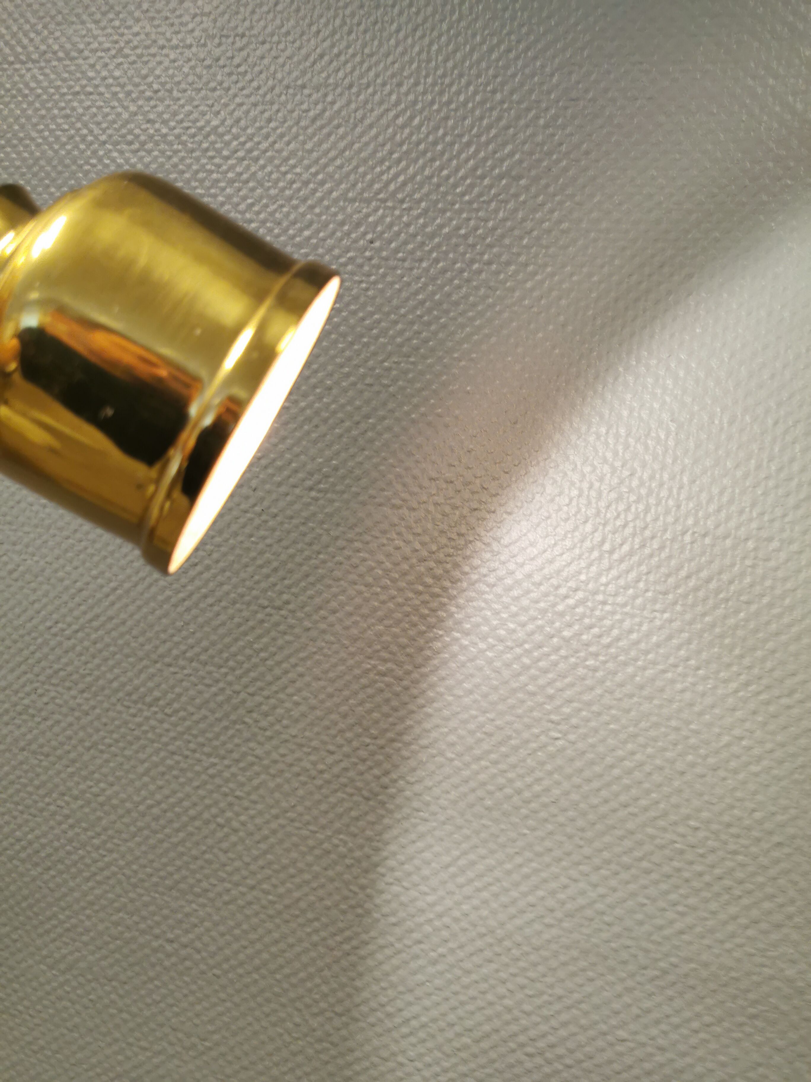 Small golden Danish hanging lamp in metal and brass.
