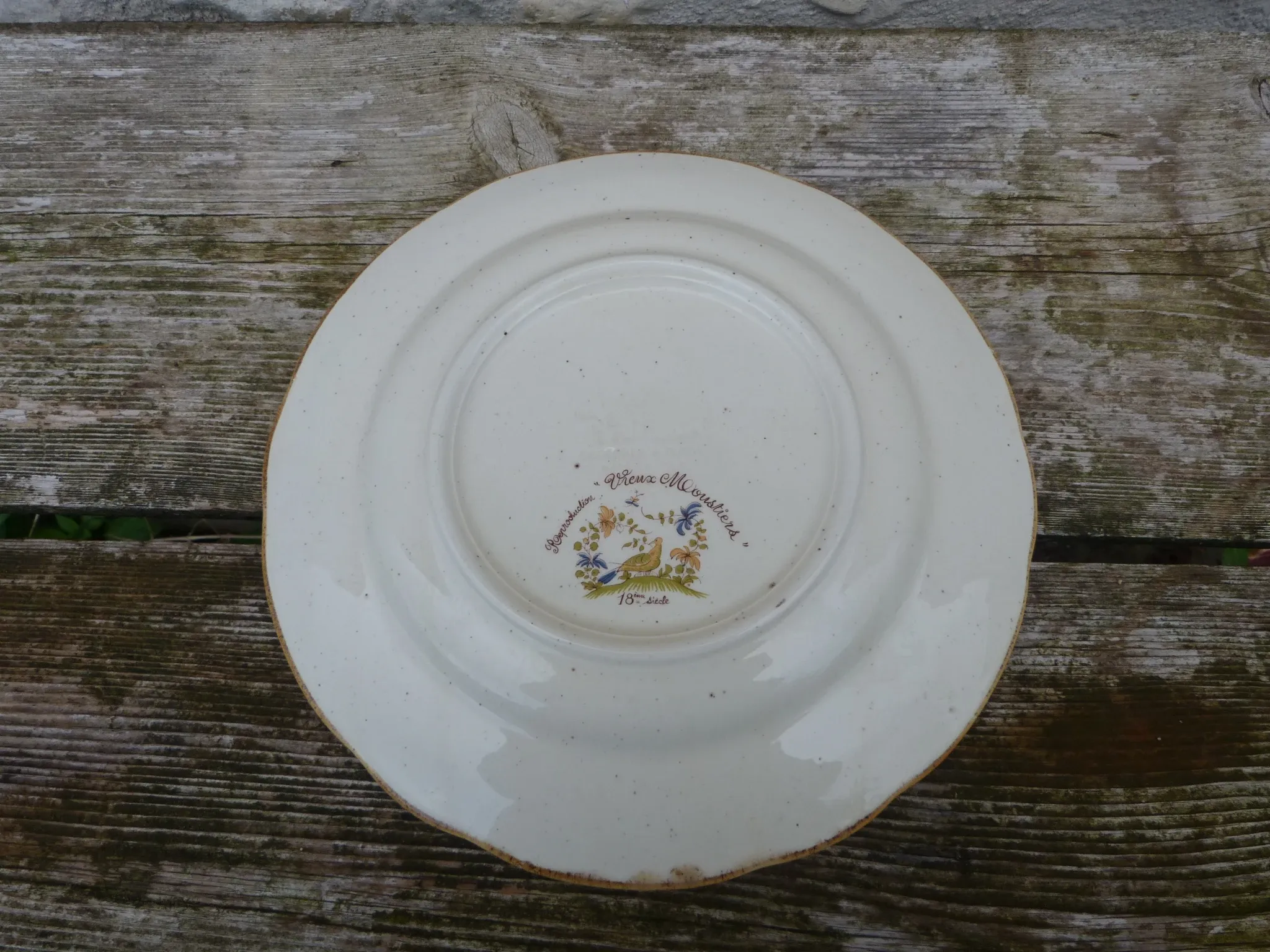 Plate reproduction of old Moustier from the 18th century.