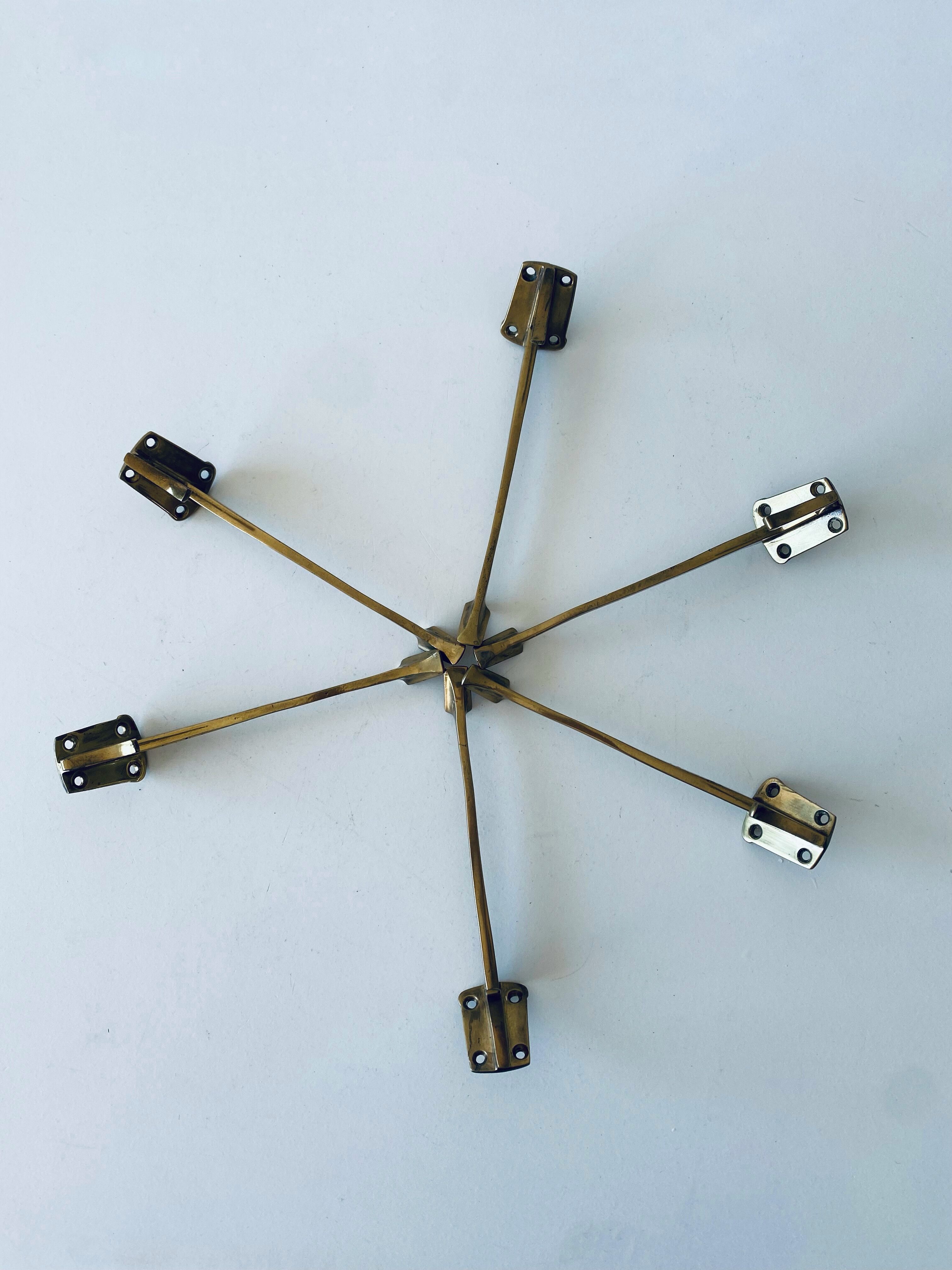 Pair of vintage brass hooks