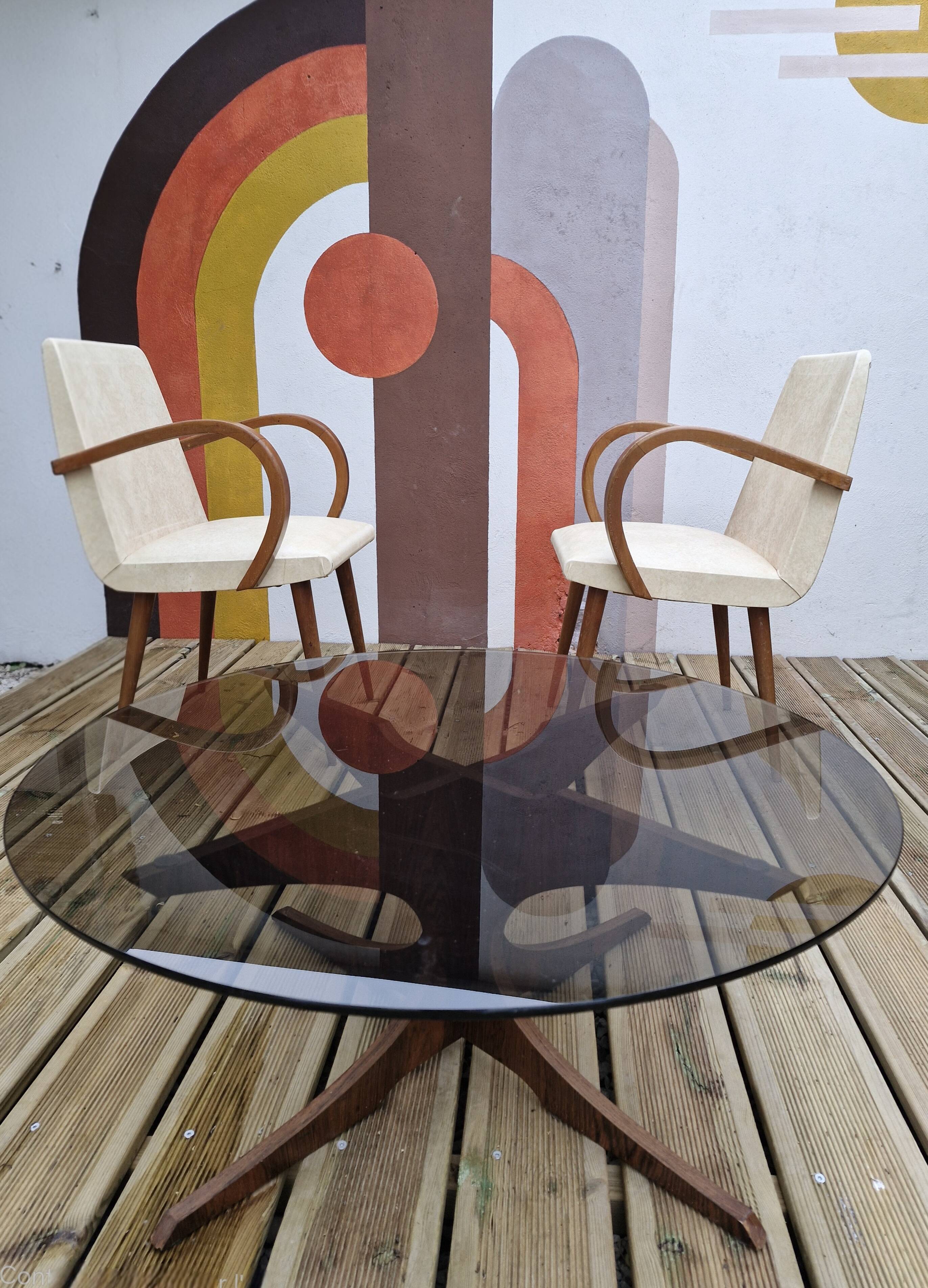 Vintage coffee table from the 60s and 70s by Hugues POIGNANT, smoked glass & teak.