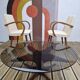 Vintage coffee table from the 60s and 70s by Hugues POIGNANT, smoked glass & teak.