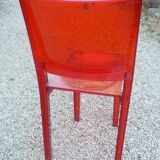 Orange design chair in polycarbonate plexiglass