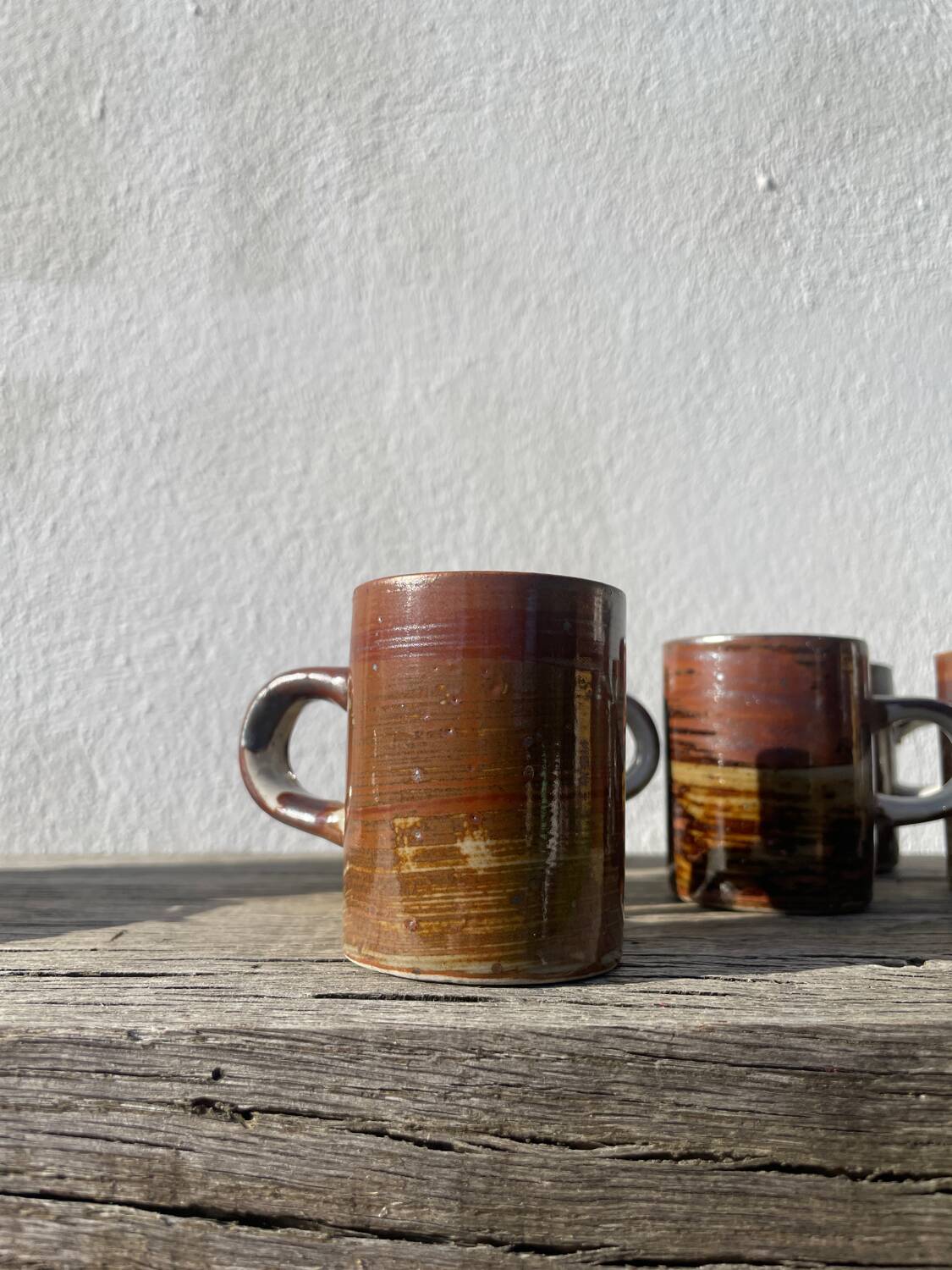 10 unique ceramic/stoneware coffee cups