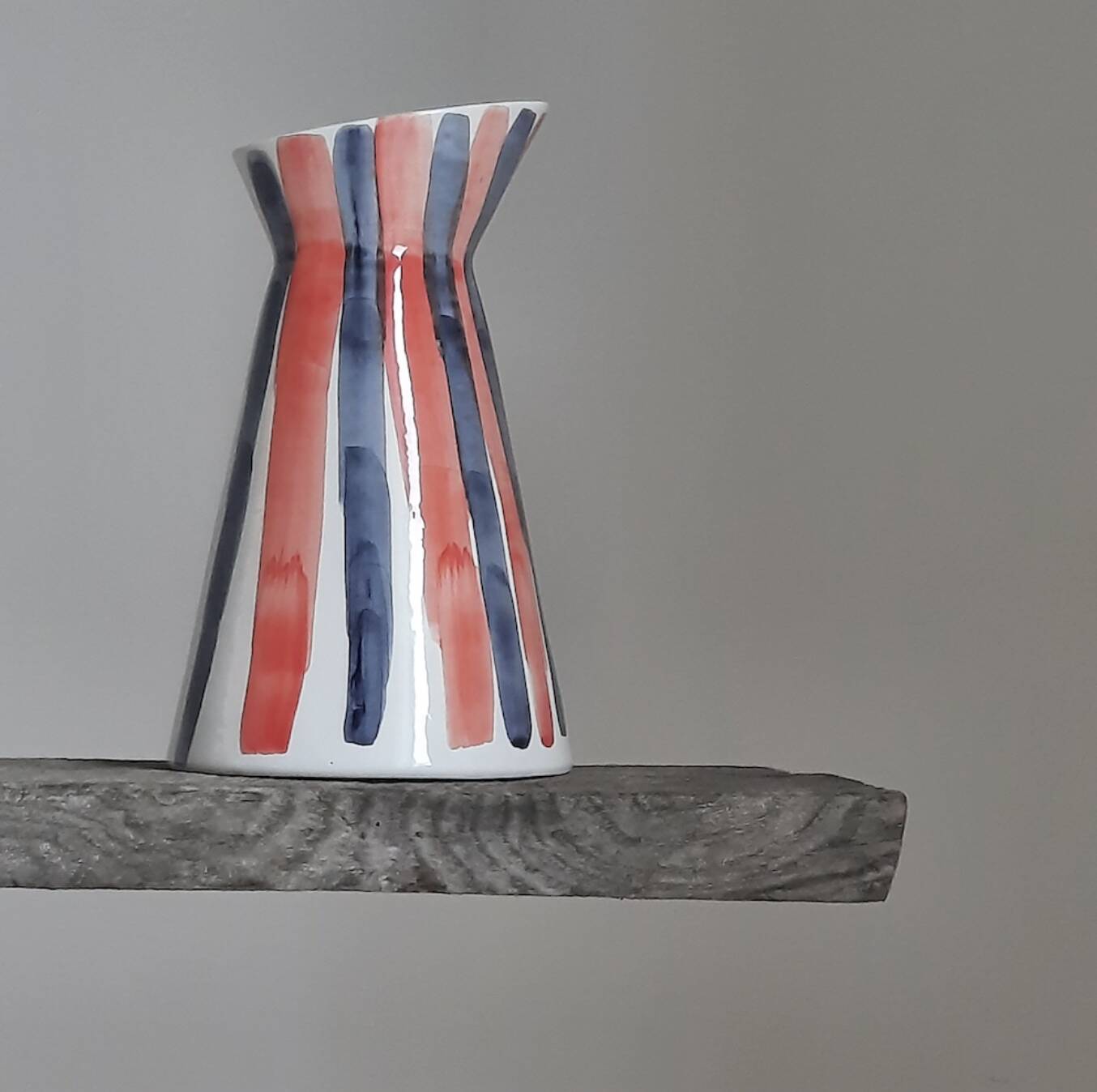 Navy and coral pitcher