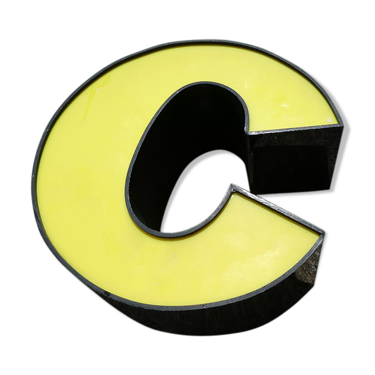 Letter C of yellow and black industrial sign