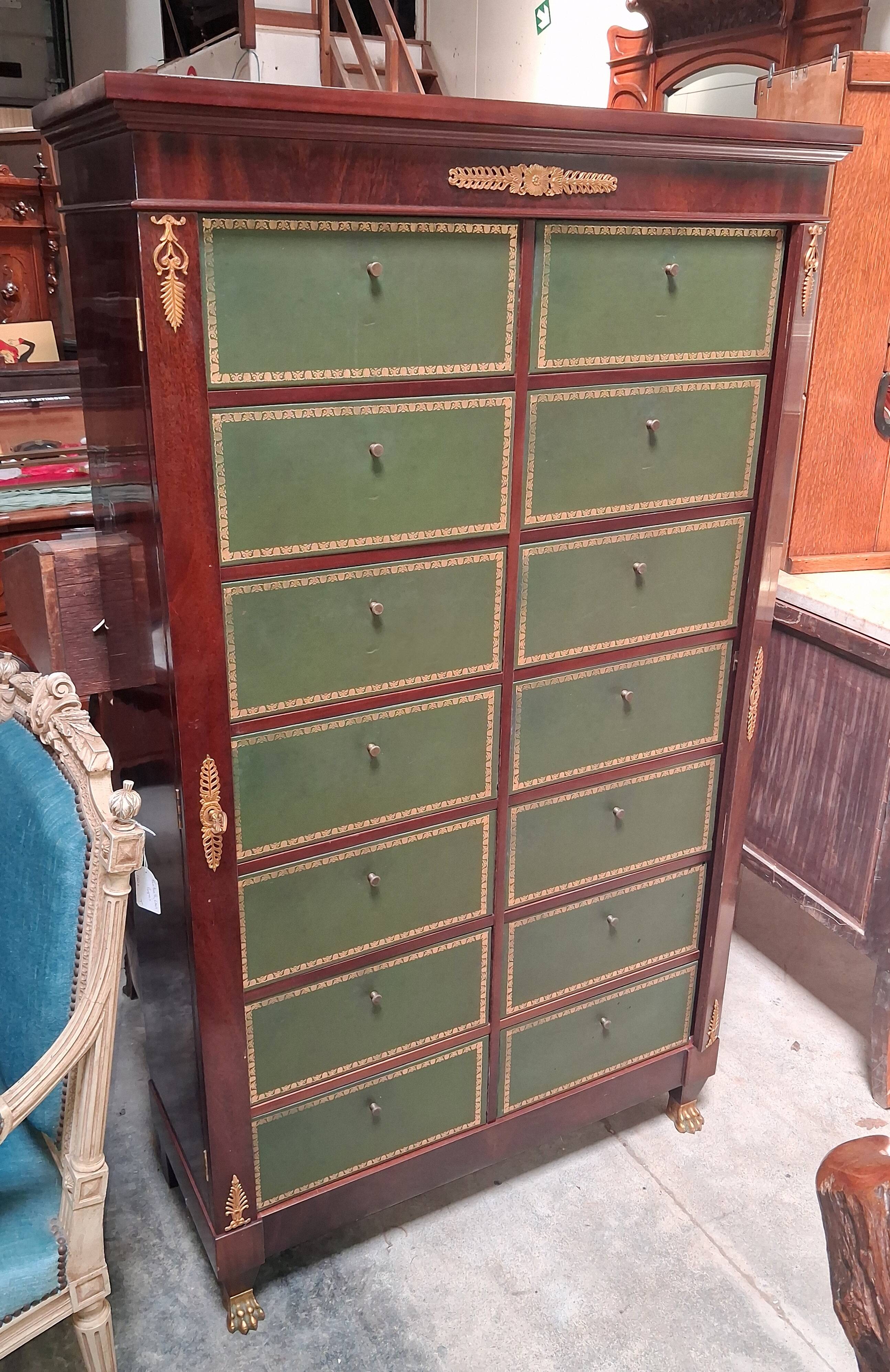 Empire-style mahogany cabinet – 12 drawers lined with green leather –