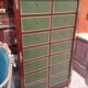 Empire-style mahogany cabinet – 12 drawers lined with green leather –