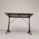 Bistro table with a marble top on a cast iron frame, 1930s.