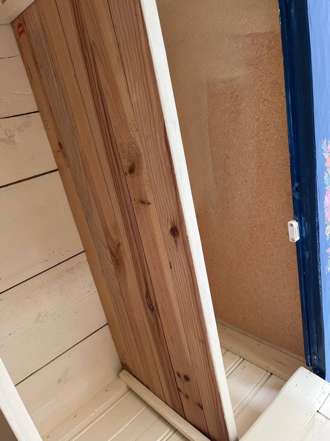 Old Parisian wardrobe painted in midnight blue