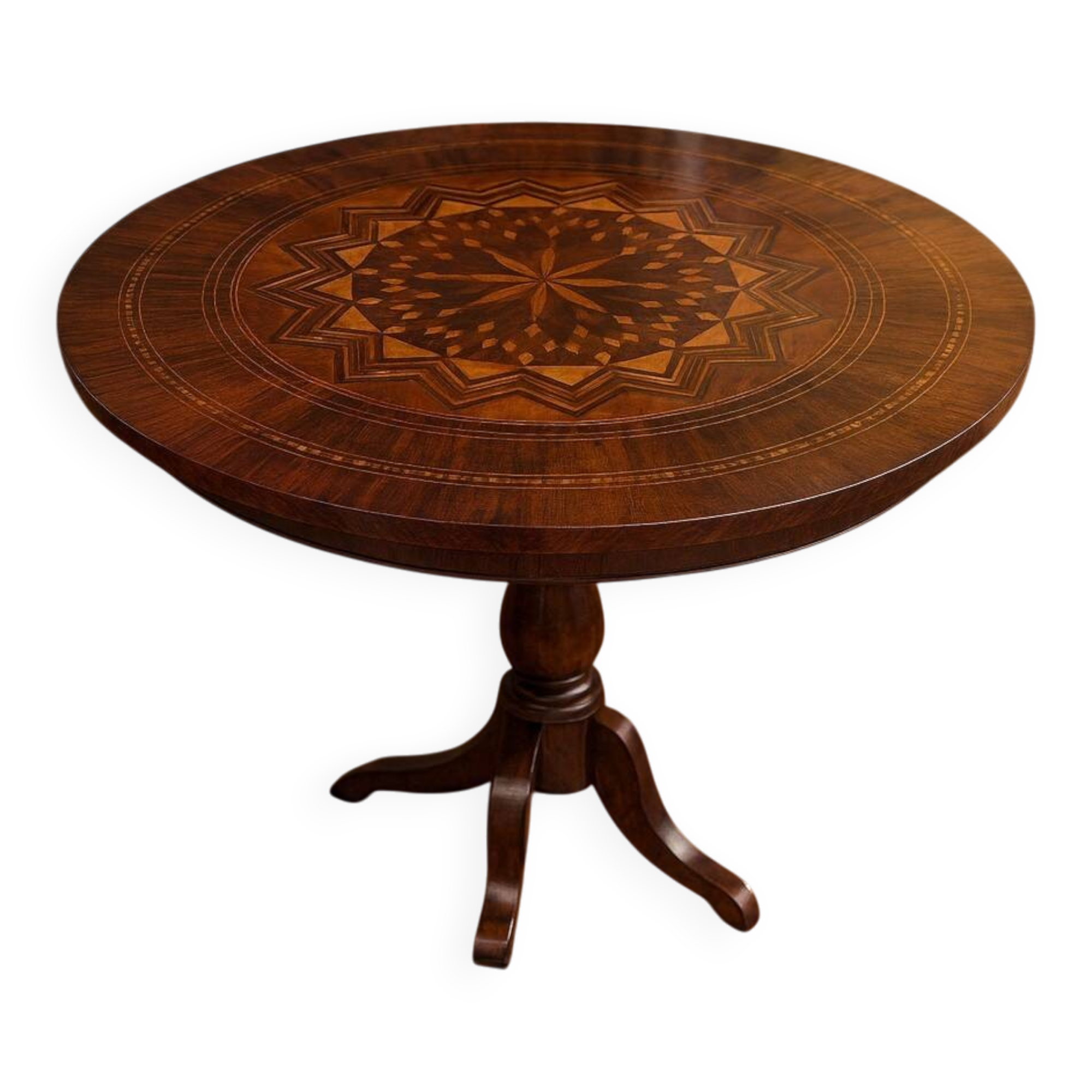 Charles X period gueridon in marquetry.