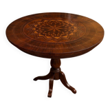 Charles X period gueridon in marquetry.