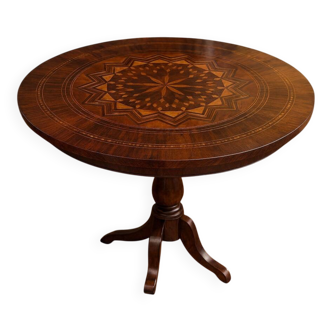 Charles X period gueridon in marquetry.