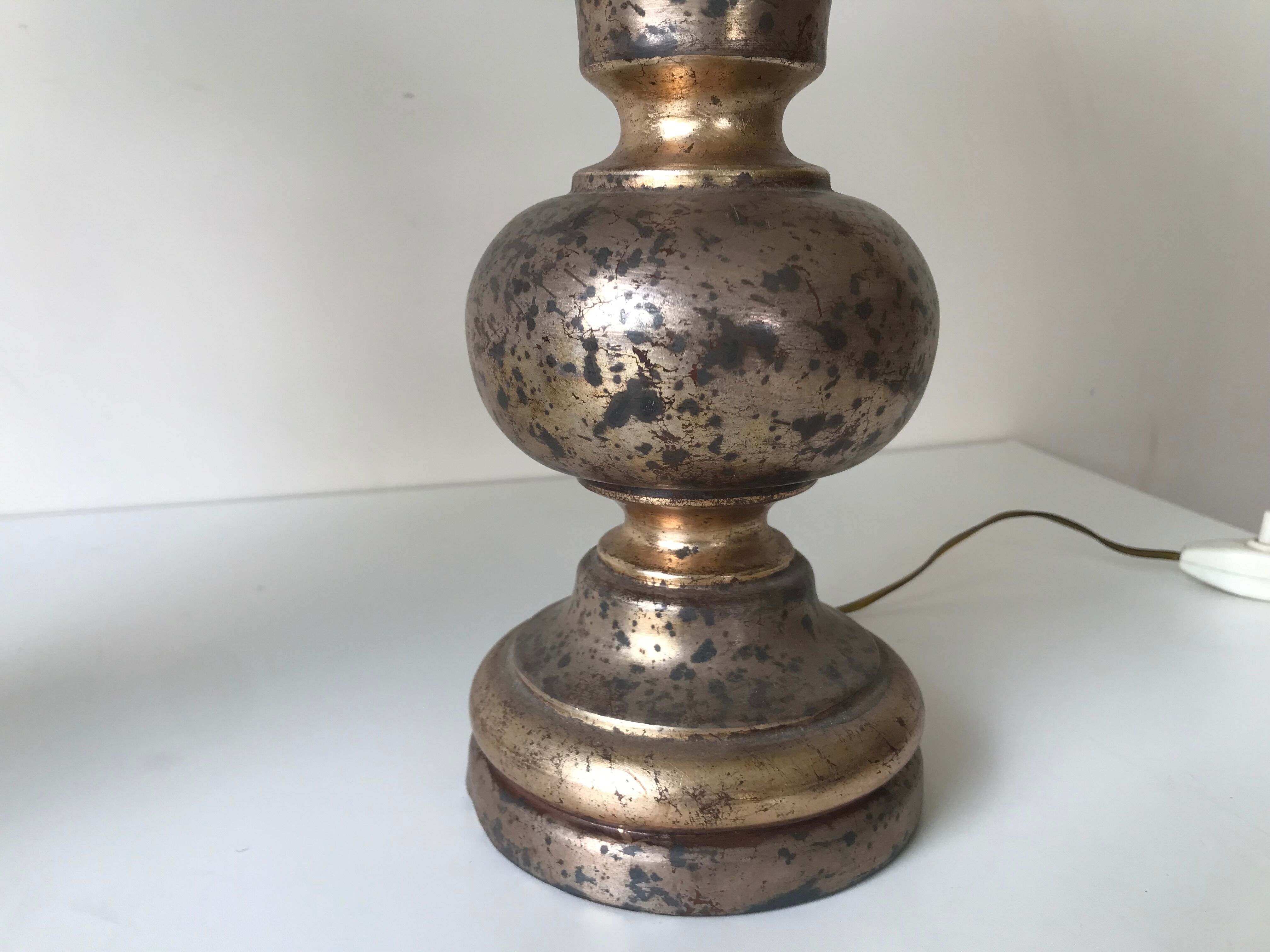 Paire de lampes florentines en bois doré, vers 1950.