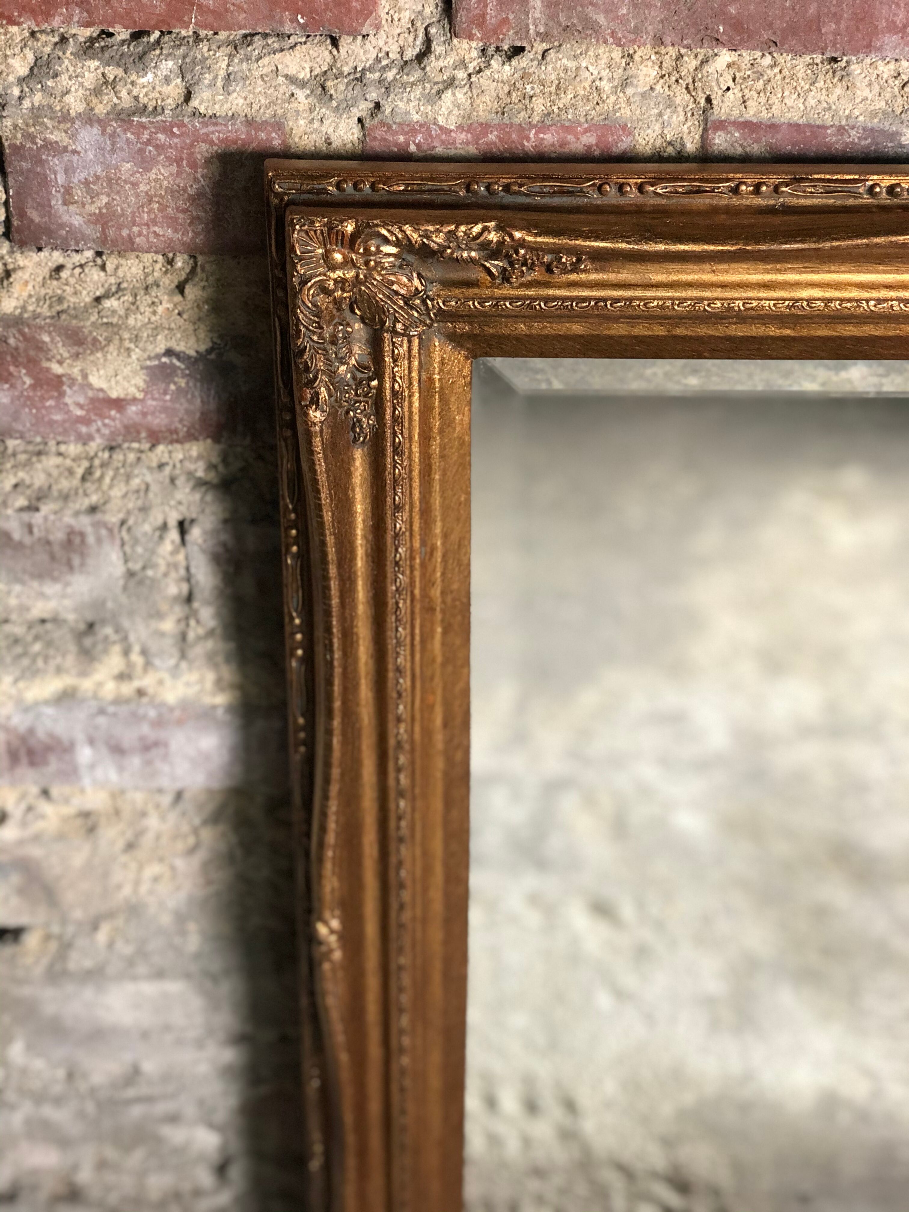 Oval mirror style Louis XV patinated gold 63 x 53 cm