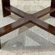 Art Deco side table in mahogany and top covered with a fabric under glass plate