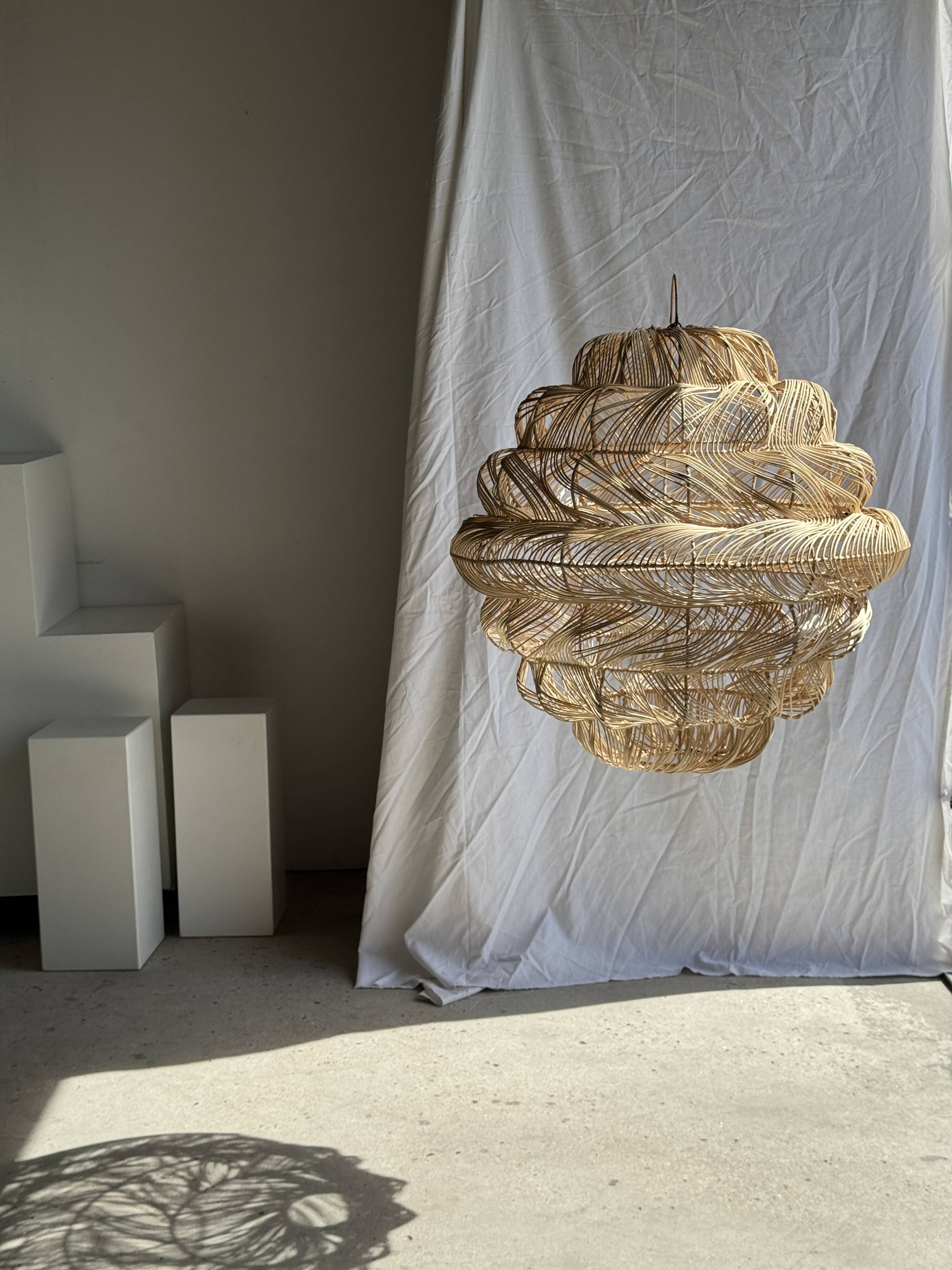 Suspension or rattan lampshade in an elongated spherical shape, layered H80 D