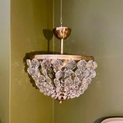 Crystal and brass chandelier pendants