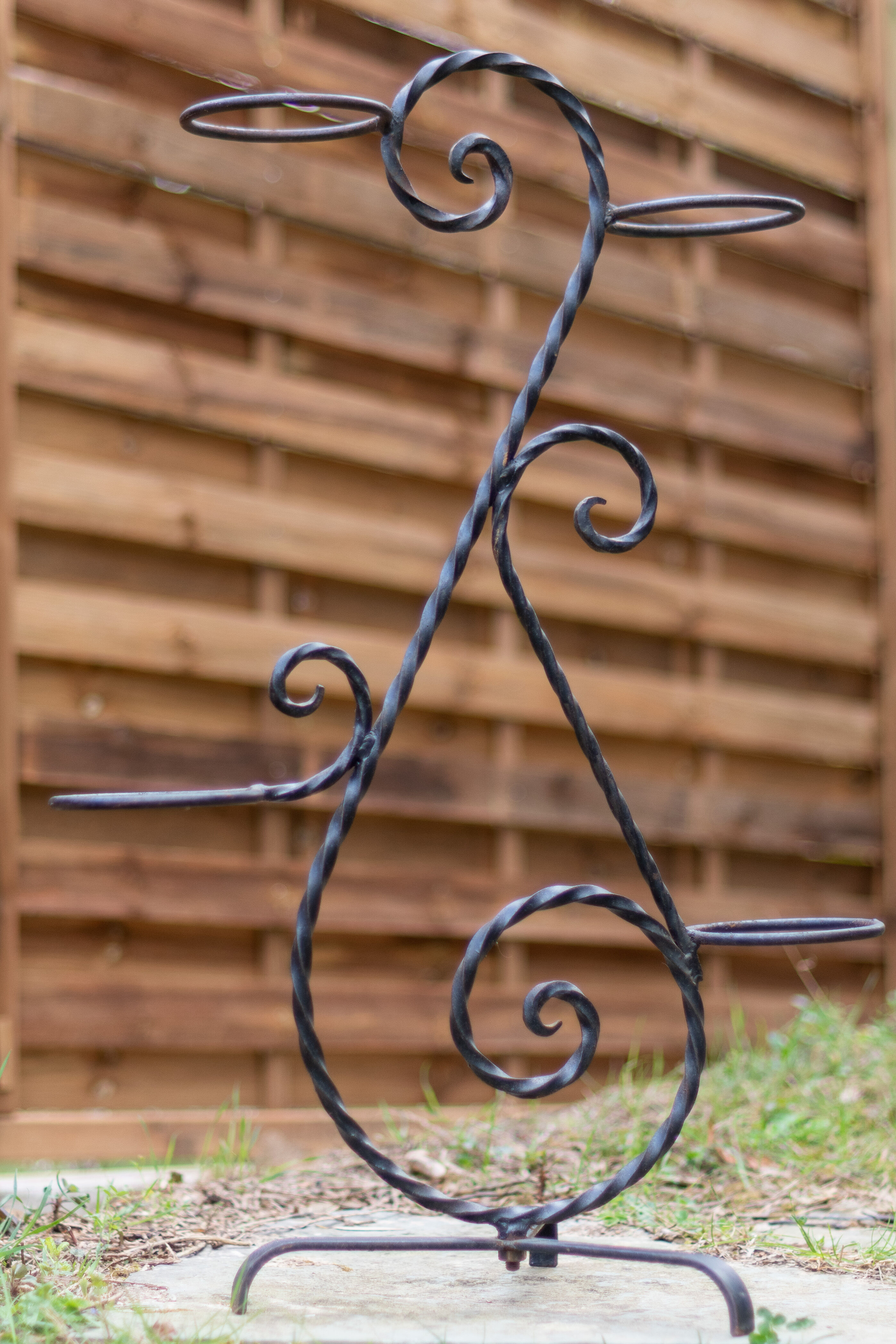 Wrought iron plant holder