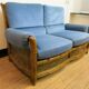 Colonial sofa two places in cannage and carved wood