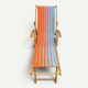Vintage deck chair with orange and blue striped fabric, original patina.