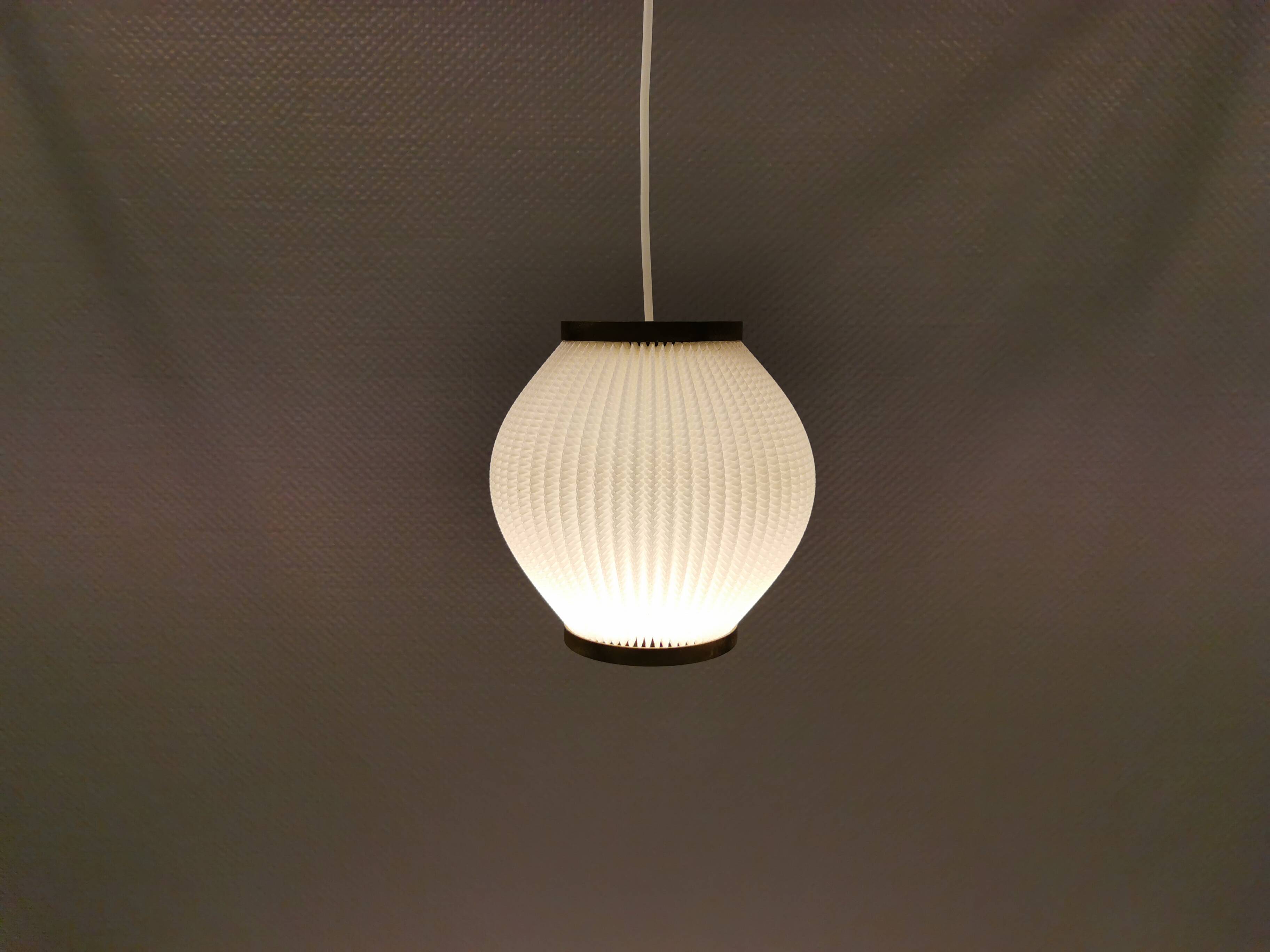 Pleated hanging lamp model Pearl Shade, produced by Hoyrup Light and designed by Lars E Schøiler
