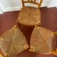 Trio of vintage straw/colored chairs