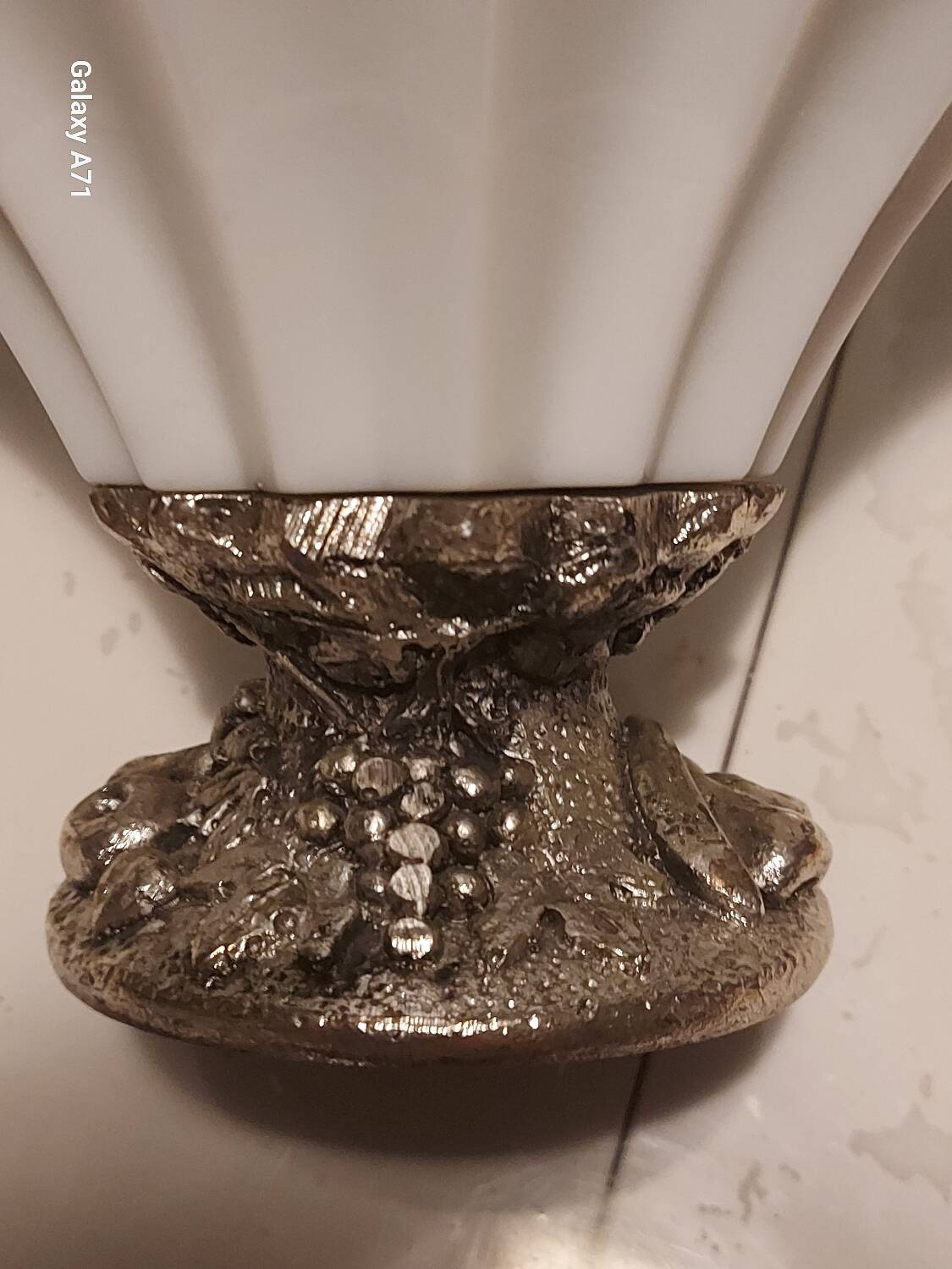 Opalescent glass bowl in the Murano style with a silver-plated metal base.