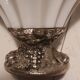 Opalescent glass bowl in the Murano style with a silver-plated metal base.