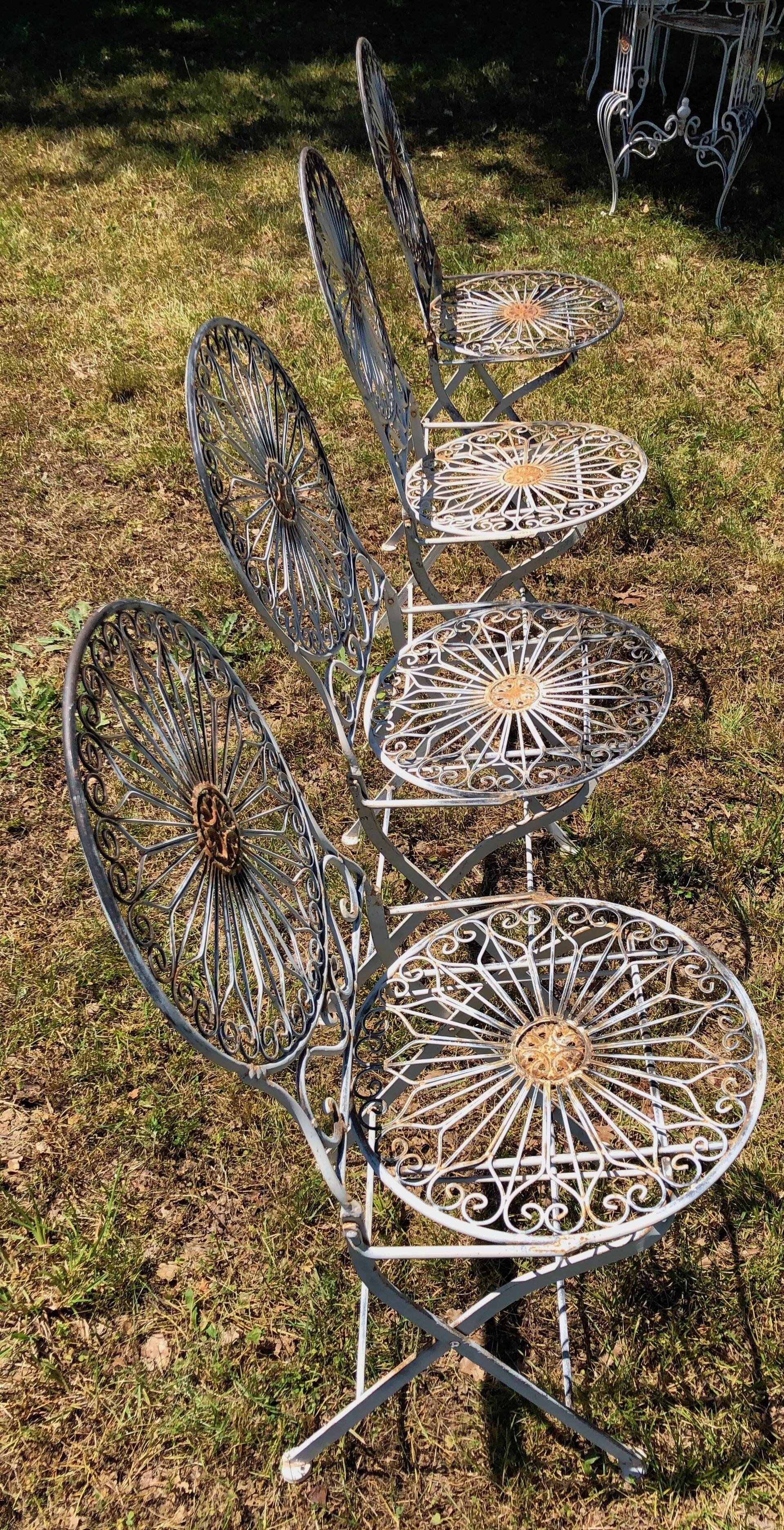 Ancient folded garden lounge in cast iron