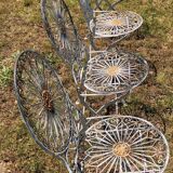 Ancient folded garden lounge in cast iron