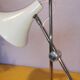 Articulated lamp in white lacquered steel and chrome, 1970.