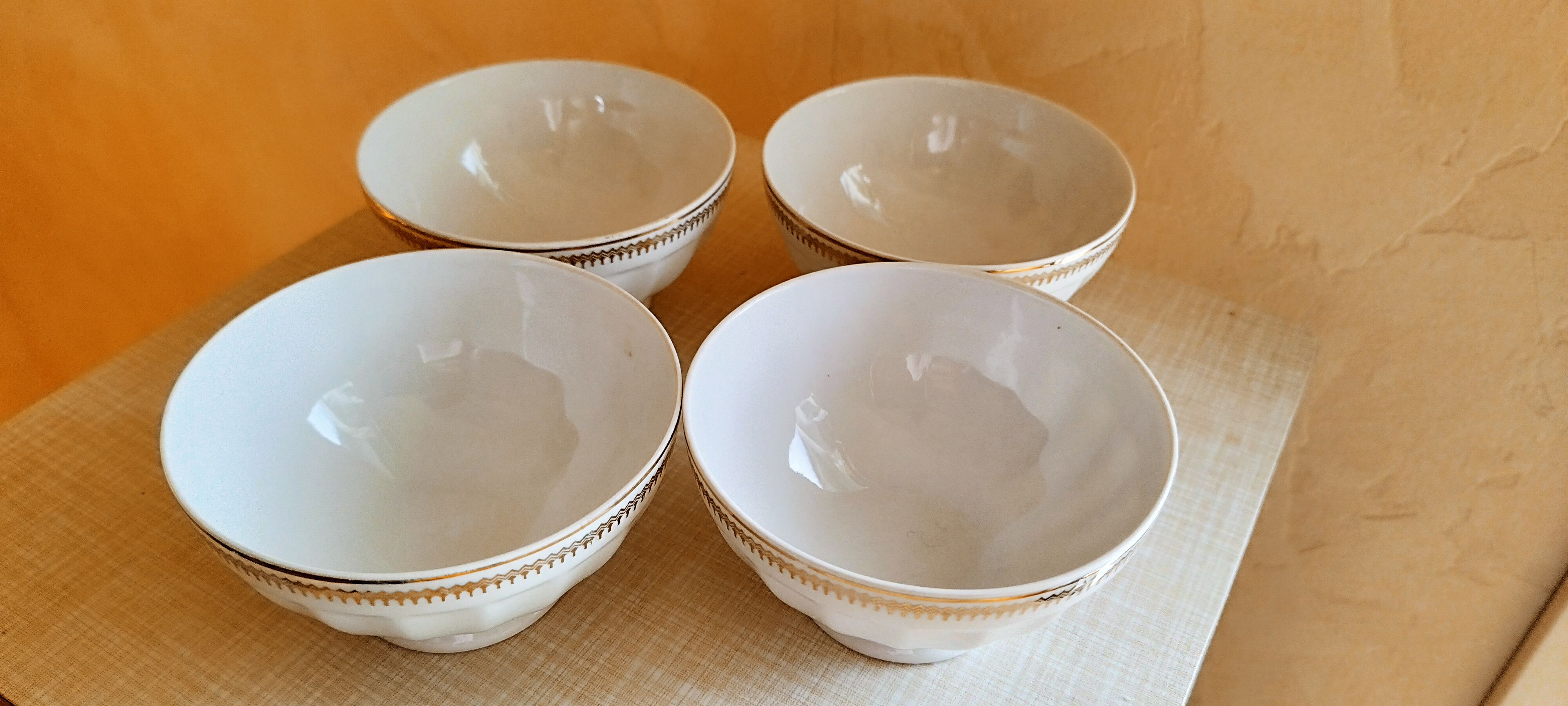 Set of 4 white porcelain bowls