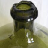 Blown green demijohn
