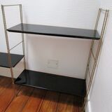 Black and gold metal tomado wall shelf