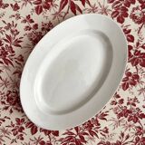 Plat ovale blanc en terre de fer Opaque de Lunéville, fin XIXe