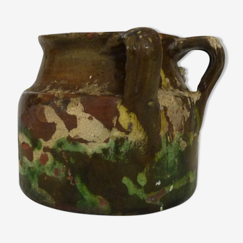 Glazed terracotta pottery with 2 handles brown yellow green. italian pottery. year 50