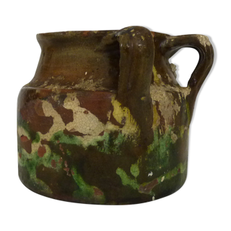 Glazed terracotta pottery with 2 handles brown yellow green. italian pottery. year 50