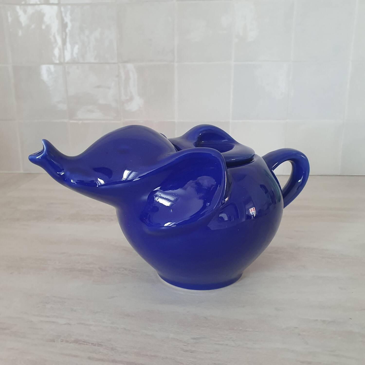 Elephant teapot by Lipton in royal blue.