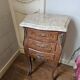 Louis XV style bedside table in marquetry with marble.