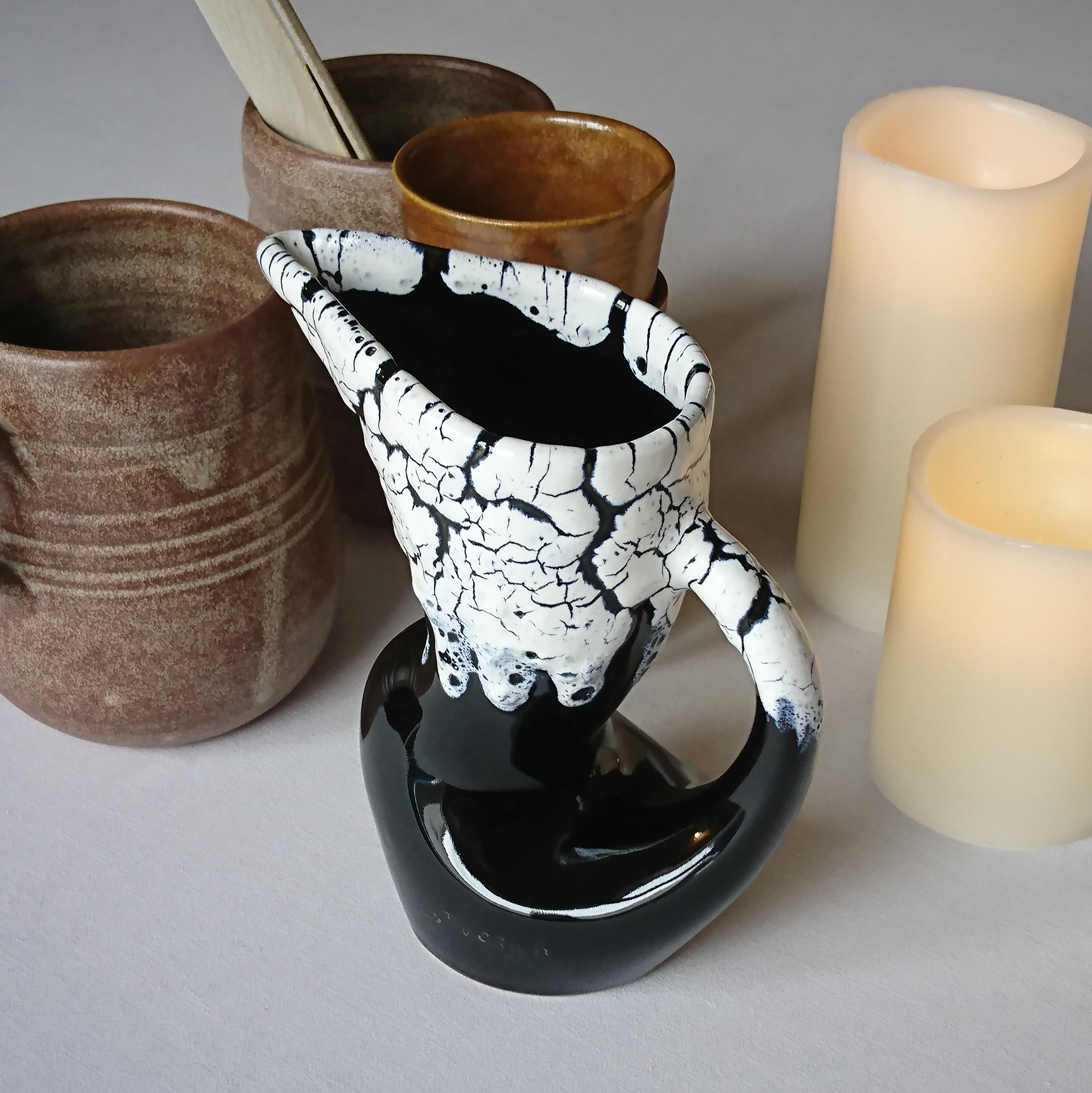 Ceramic pitcher fat lava midnight blue and white signed