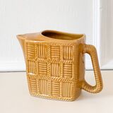 Barbotine ceramic pitcher