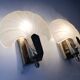 Pair of vintage shell glass wall lights, Art Deco style fixtures.