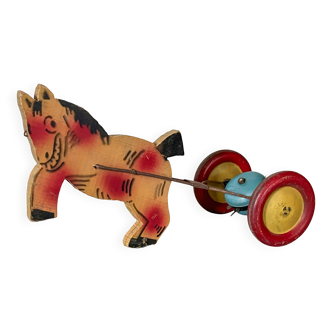 Vintage pull-along toy, horse-drawn with a bell, musical toy.