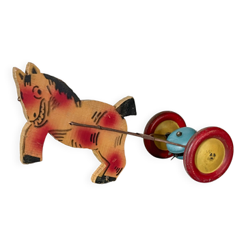 Vintage pull-along toy, horse-drawn with a bell, musical toy.