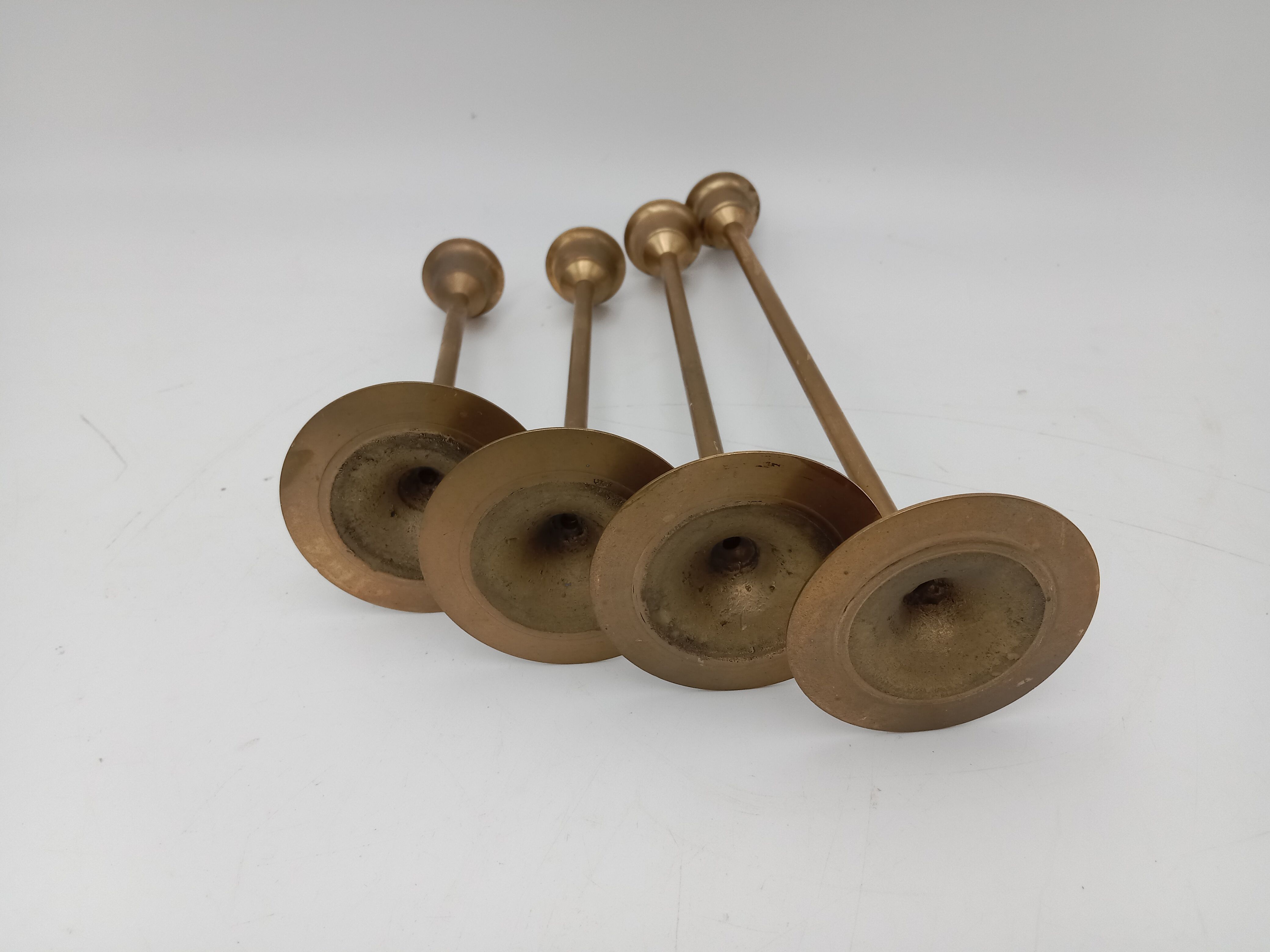 Series of 4 Scandinavian brass candle holders