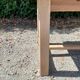 Solid oak farmhouse table in raw wood