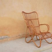 Vintage rattan chair by Louis Sognot